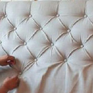 hotel bed ornamental details.webp